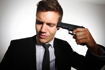 Businessmann mit Pistole