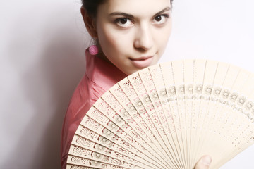 Portrait of the girl with a fan.