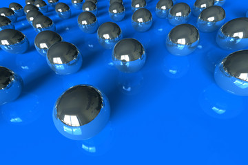 Rolling balls on blue surface