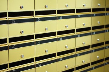 A wall of letter boxes for an appartment