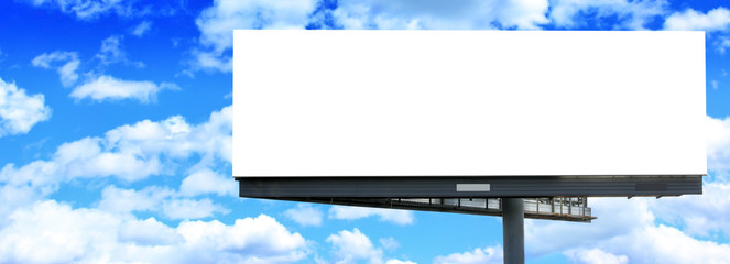 Blank billboard against blue sky - 15561698