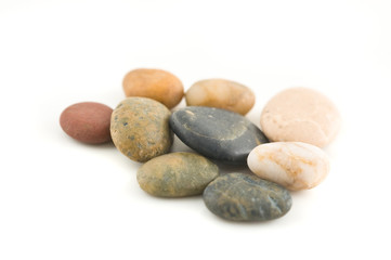 Group of stones on white background, close up shot.