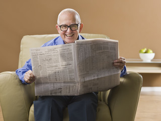 Elderly Man Reading Newspaper