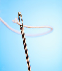 Needle with a thread