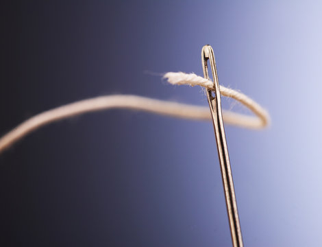 Needle with a thread