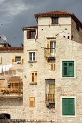 Fototapeta na wymiar Historic tall houses in downtown Sibenik, Croatia