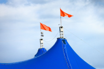 red flags on top of circus tent © Alexey Zarodov