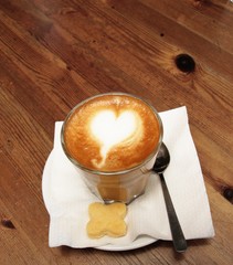 Cafe latte with heart shape foam