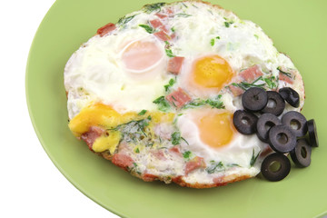 fried eggs and black olives