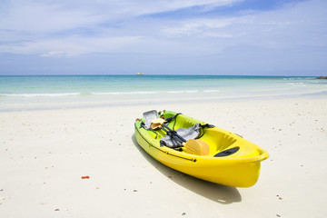 Rowboat on beach of Thailand