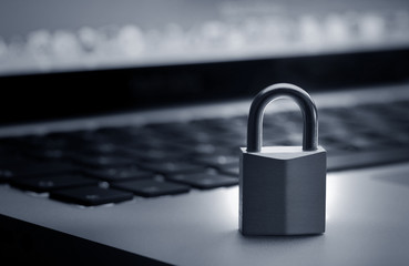 Fototapeta premium Lock on laptop keyboard