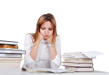 Worried girl between lot of books