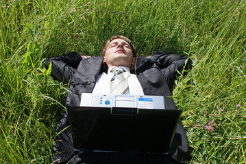 Businessman relaxing after hard workhours