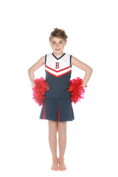 Cute Girl In Cheerleader Outfit And Pompoms