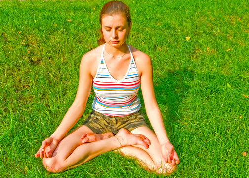 girl in yoga pose in the park