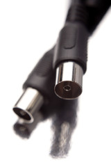 Plugs and cables on white background