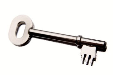 Door key on white background