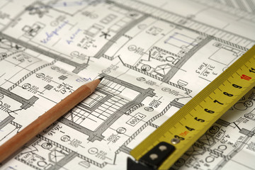 Pencil, ruler and a business plan