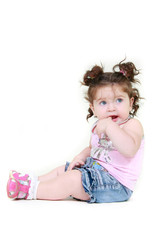 cute toddler girl over white