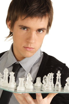 a man with a chess board