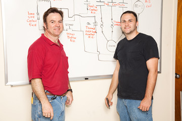 Obraz premium Engineering Student and Teacher