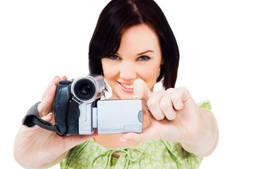 Close-up of woman holding home video camera