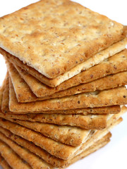 Tower of integral crackers on white background