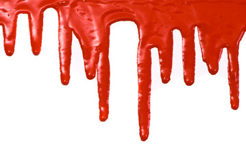 Red paint pouring on white background