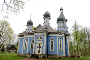 Fototapeta na wymiar The old wooden blue church in Lietuva