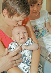 Mother try to soothe her baby