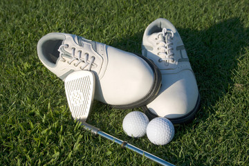 Golf accessories on the grass green