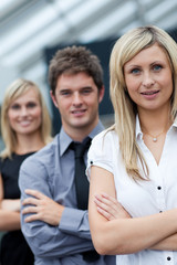 Portrait of a businesswoman in front of her team