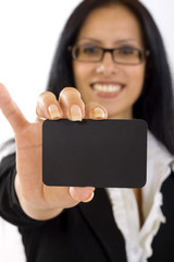 closeup of a businesscard held by a woman