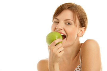 Portrait of young beauty woman with green apple