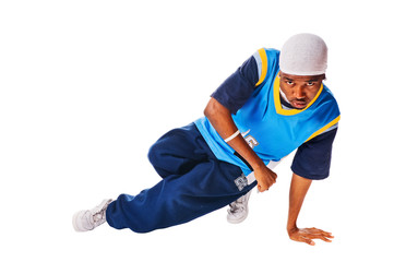 Hip-hop young man making cool move on white background