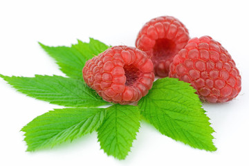 Fresh raspberries on white background