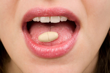 Naklejka premium woman taking pills 2