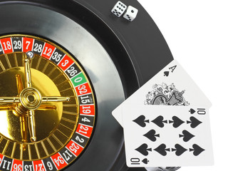 The casino roulette and playing cards. Isolated