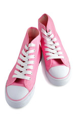 Paire de chaussures montantes roses sur fond blanc