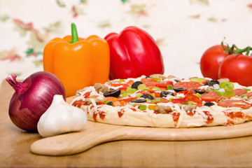 Fresh italian pizza and vegetables