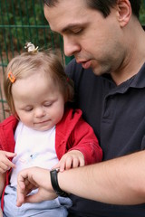 father is playing with his daughter