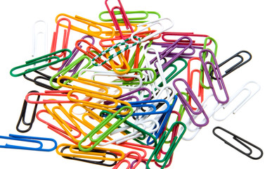 Color paper clips to background. Isolated on white