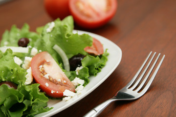 Greek salad and fork