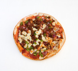 Isolated green pepper and spicy beef pizza