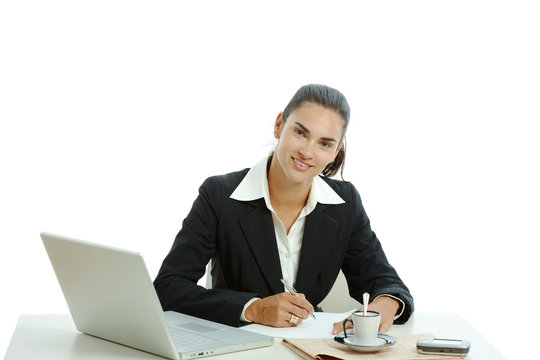Businesswoman writing notes