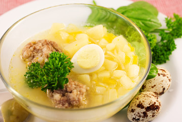 Soup with eggs and 	meatball