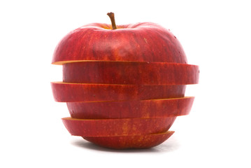 Sliced red apple on studio white