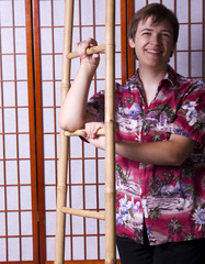 Male teen with ladder