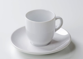 White cup and saucer