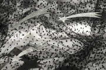 Stelle comete su tulle nero